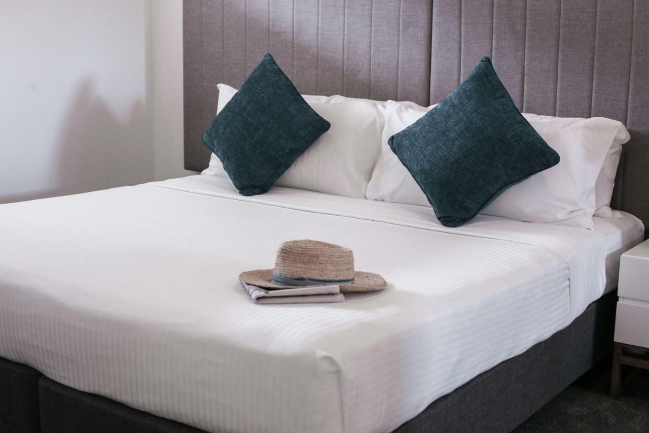 Rumba Beach Resort Caloundra Exterior photo A bed with a pillow